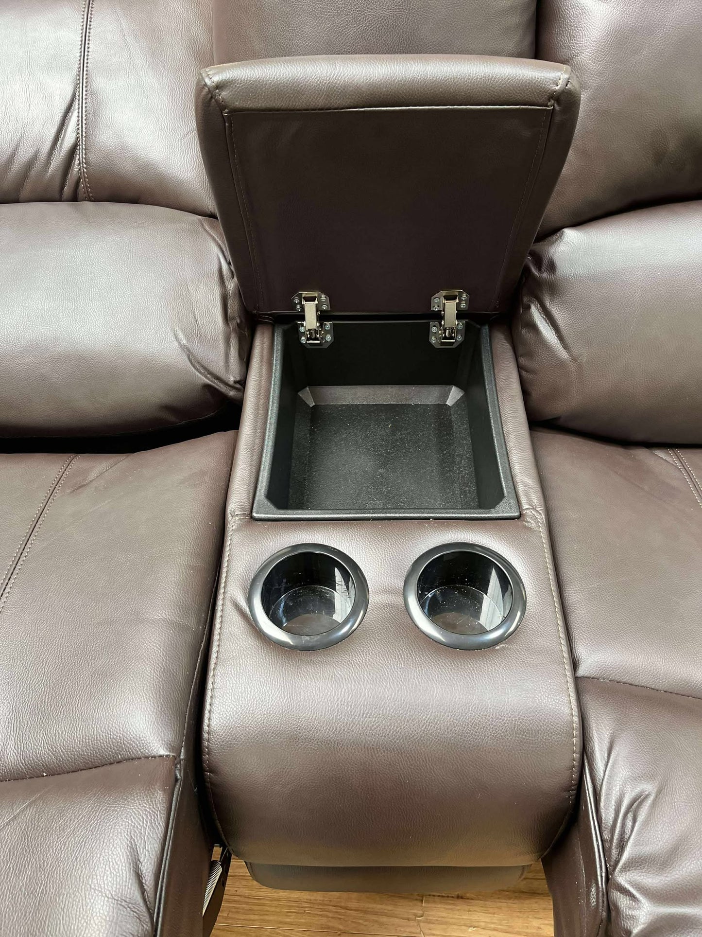 Haden Brown Faux Leather 2 Seater Manual Reclining Sofa with Storage Arm Cup Holders