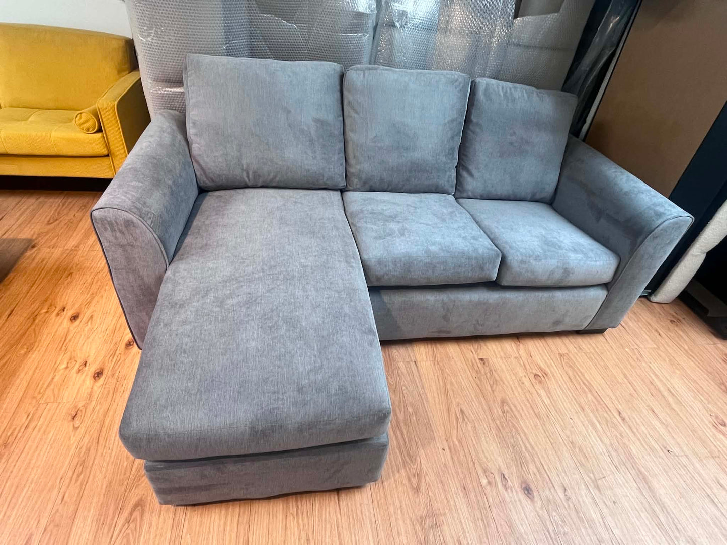 Melis Grey Upholstered Sofa with Adjustable Chaise