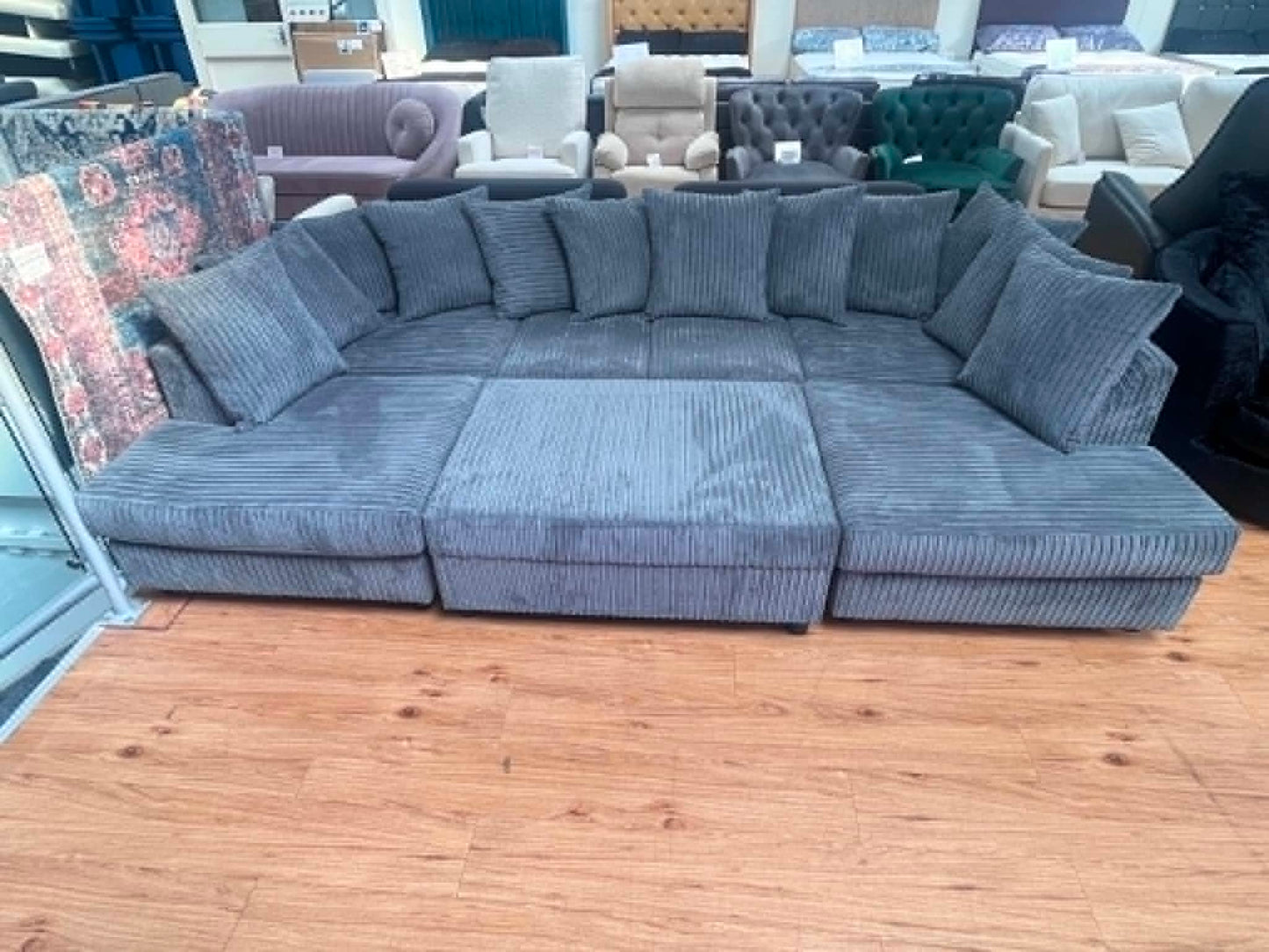 Abby 7 Seat Grey Jumbo Cord U Shape Sofa Bed with Removable Footstool