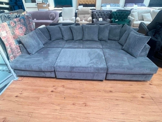 Abby 7 Seat Grey Jumbo Cord U Shape Sofa Bed with Removable Footstool